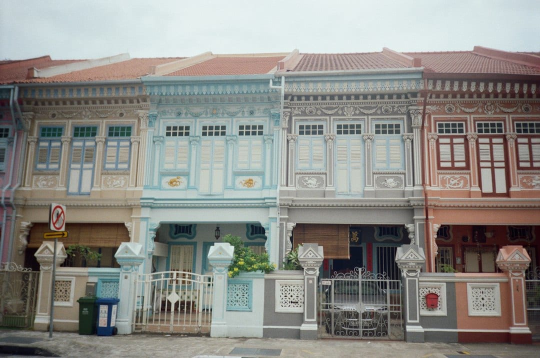 Traditional colourful shophouses on a city street
